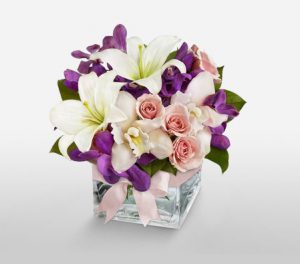 Blooming Elegance Assortment of Mixed Flowers - Free Cube