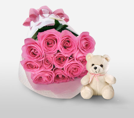 pink roses with teddy bear